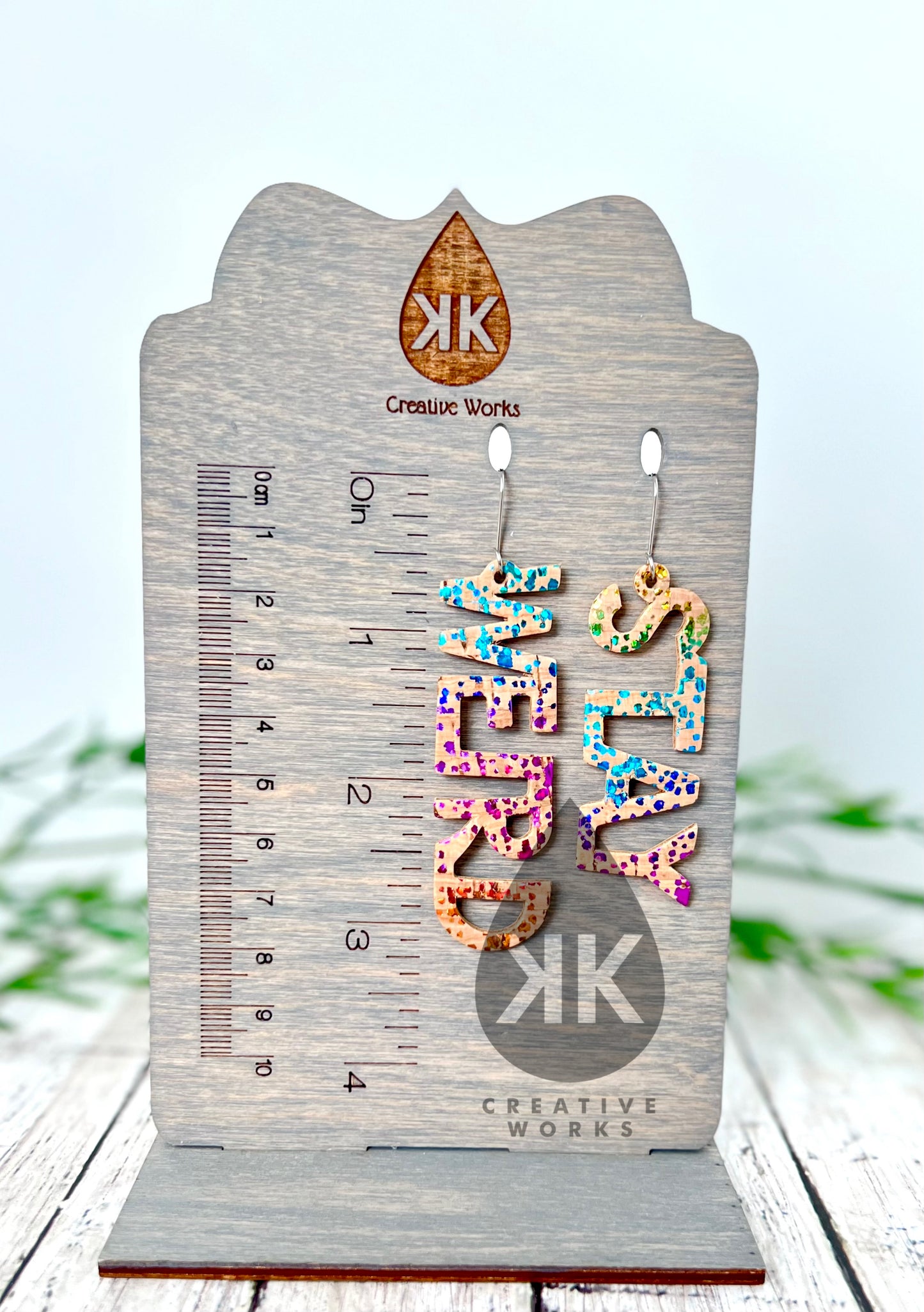 “Stay Weird” rainbow cork earrings